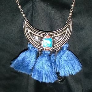 My grandma's tribal silver colored necklace. $14.